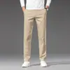 Nuevos Pantalones Casuales Elásticos para Hombre 2026, Primavera y Verano, Pantalones Ajustados Rectos Color Blanco Roto para Hombre, Pantalones Versátiles de Moda para Hombre