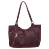 Bolso tote retro europeo y americano de nicho para mujer, principios de otoño 2026, gran capacidad, bolso versátil para el hombro y debajo del brazo con un estilo post-apocalíptico