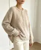 Bestseller transfronteiriço europeu e americano: cardigan de tricô liso e macio para mulheres, casaco suéter fofo de abotoamento simples e gola redonda para outono e inverno