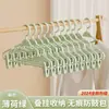 Ferramenta de armazenamento de cabides para uso doméstico, clipes de calça no atacado, clipes de saia JK, antiderrapantes e sem marcas, cabides plásticos multifuncionais atualizados para calças