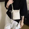 Moda transfronteriza exquisita de alta gama 2026 nuevo bolso de teléfono simple para mujer de diseño nicho primavera-verano, para llevar al hombro y cruzado