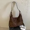 Bolsa Casual Artística Japonesa Moda Animal Print Leopardo Outono 2026 Nova Cor Sólida Simples Ombro Cruzado Bolsa Feminina