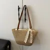 Bolso de Paja Tejida de Verano Transfronterizo 2025 Bolso de Playa para Vacaciones en la Costa Gran Capacidad de Paja Versátil Bolso de Hombro Tipo Cubo