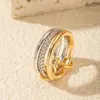 Anillo de Luz de Zirconia Incrustada en Oro Real Chapado en Cobre Transfronterizo Europeo y Americano Lujo Ligero Sensación de Alta Gama Anillo para el Dedo Joyería de Mano Versátil Fabricante Venta al por Mayor en Stock