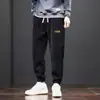 Pantalones de chándal de pana para otoño para hombre, pantalones casuales de retazos, corte holgado, versátiles, pantalones jogger de moda, pantalones largos para hombre