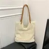 2026 Bolso de Mano Tejido Nuevo para Mujer Gran Capacidad Bolso de Hombro Tejido de Paja Hueca Bolso de Mano Versátil Casual de Verano