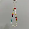 Cadena para teléfono móvil hecha a mano casera ins cadena colgante de cuentas de colores nicho ccd cordón lindo cámara