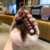 Suerte Colgante de Peluche de Caqui Llavero Adorno Caqui Suerte Colgante para Coche Adorno de Piel Sintética de Conejo Regalo