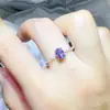 Anillo de moissanita morado con forma de huevo ovalado al por mayor estilo europeo y americano anillo de diamante bolígrafo de prueba cruzada caliente nuevo transfronterizo
