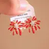 Brincos de Fogos de Artifício com Diamante Cintilante Vermelho para Mulheres 2026 Novo Estilo Quente Brincos Pequenos e Delicados Adequados para o Inverno