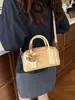 Bolsos de Diseño de Nicho para Mujer Primavera/Verano 2026 Nuevo Bolso Cruzado Versátil Bolso de Mano Moda Simple Mini Bolso Cuadrado