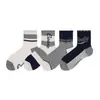 Nuevos calcetines para hombre de otoño e invierno, deportivos y casuales, calcetines versátiles sin costuras de media pantorrilla, con bloques de color, industria de calcetines de Zhuji, calcetines absorbentes de sudor y resistentes al olor para estudiantes
