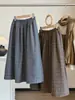 Saia Midi Plaid de Lã Estilo Academia Japonesa Coreana Feminina Outono Inverno 2026 Nova Cintura Alta Emagrecedora Saia Evasê
