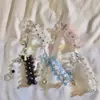 Estilo Chanel Encaje Corazón de Niña Lazo Hecho a Mano DIY Cadena para Teléfono Móvil Portátil Original Cámara CCD Adornos Colgantes