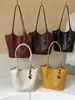Bolso tote grande de patrón tejido transfronterizo para mujer, nuevo modelo 2026, bolso de hombro de color liso simple y elegante estilo coreano de nicho