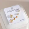 Set de pendientes transfronterizo europeo y americano de 3 piezas, exquisitos pendientes combinados de corazón y mariposa, elegantes pendientes de acero inoxidable para mujer