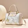 Bolsas femininas 2026 novo modelo bolsa de grande capacidade, bolsa Boston feminina moderna de ombro e transversal com um toque de luxo