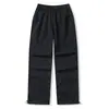 Calça longa casual Sidalet para casal, de corte solto, estilo workwear, perna reta e larga, com múltiplos bolsos, apresentando um design relaxado e estiloso.