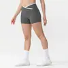 Pantalones de yoga de cintura en V europeos y americanos, shorts deportivos cortos de secado rápido para mujer con efecto melocotón en los glúteos, shorts de fitness de cintura alta para levantar glúteos para el verano