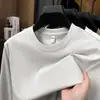 Camiseta de Algodón de Manga Larga Estilo Nuevo Primavera y Otoño Color Sólido Holgada Cuello Redondo Sudadera de Manga Larga Casual para Hombre Capa Base