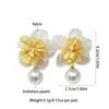 Pinzas para orejas florales hechas a mano estilo vacacional de dopamina sin perforación para mujer, pendientes de perlas dulces y versátiles para el verano