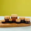 Tapa de Madera de Bambú Personalizada Botella de Vidrio Marrón para Crema de Ojos/Crema Mascarilla 5-100g Botella Vacía Portátil a Prueba de Luz