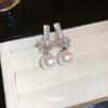 Aretes de perlas anudadas de circón de aguja plateada, aretes de estilo elegante y moderno de lujo ligero, aretes simples personalizados de alta gama al por mayor