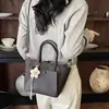 Bolsa de mensajero de alta calidad, estilo vintage, nueva colección 2026, bolso de mujer simple y elegante, bolso de hombro versátil, bolso tipo cubo a la moda