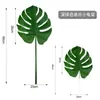 Venta caliente de Amazon hojas tropicales artificiales flores plantas verdes con césped floral decoración del hogar manualidades de plantas verdes