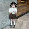 Conjunto de Verano Estilo Coreano para Niñas 26 Nuevo Estilo Academia Niña Pequeña Camisa de Manga Corta Plisada Cuello de Muñeca Pantalones Cortos de Encaje