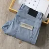 Jeans Rectos de Verano Ultra-delgados de Tencel Transpirables Color Azul Claro Lavados Suaves de Sarga Elásticos de Cintura Media-Alta de Negocios para Hombre