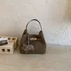 Bolso Pequeño de Mano para Mujer, Nuevo Estilo Primavera 2026, Bolso de Hombro Retro de Alta Gama, Bolso Cruzado Tipo Cubo para Viajes al Trabajo