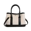 Bolso de jardín de temperamento moderno y elegante de nicho, bolso de mano versátil simple personalizado, bolso cruzado elegante para el día a día del viajero