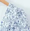 2026 Nuevo Vestido de Vacaciones Estilo Europeo y Americano Retro Francés Floral Cuello en V Ajustado Mangas Abullonadas