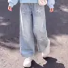 Conjunto de Duas Peças da Moda para Meninas 2026 Primavera e Outono: Blusa Versátil Estilo College e Calça Jeans Denim com Estrelas