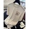 [Producto Destacado] Yuran 26 Estilo Nuevo de Principios de Primavera Algodón Lino Amigable con la Piel Lavado Enzimático Estampado Graffiti Bordado Camiseta de Manga Corta