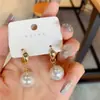 Nuevo estilo japonés y coreano dulce fresco simple metal hebilla de oreja elegante diseño de nicho pendientes de perla elegante moda joyería para orejas