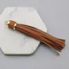 Color Sólido de Gran Venta Colgante de Borla Encanto de Bolso de Borla de PU Pulsera de Cuentas de Silicona Colgante Llavero Accesorio de Pulsera Colgante