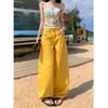 Pantalones de hoz de herramientas Primavera y Verano Americano 2025 Jeans cimitarra bordados para mujer Retro Amarillo Sentido del diseño Sueltos
