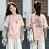 Camiseta de manga comprida com desenho para meninas, conjunto de duas peças de outono, novo estilo 2026, para crianças de tamanho médio e grande, camada base de algodão puro