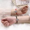 Pulsera de Pareja con Candado de Larga Vida de Piedra Lunar para Hombres y Mujeres Diseño de Nicho Ins Cuerda Roja de Mano Benmingnian Pulsera Tejida Ruyi