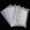 Marca de ropa infantil bolsa de embalaje bolsa transparente con cierre esmerilado ropa por estilo en stock enviar muestras personalización de LOGOTIPO pedido mínimo uno