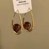 Pendientes Minimalistas Metálicos Populares Transfronterizos Europeos y Americanos de Aguja de Plata S925 Pendientes de Botón de Personalidad Simples Versátiles