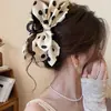 Atacado de acessórios de cabelo Dongdaemun Coreia: Grampos de cabelo da nuca da moda para mulheres, presilhas tubarão de alta qualidade e requintadas