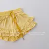 Foto Real de la Nueva Falda de Volantes Estilo Coreano para Niños Verano 2026 con Diseño Anti-Exposición, Falda Dulce