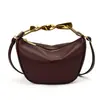 Bolso pequeño de alta gama de nicho para mujer 2026 nueva moda casual bandolera cruzada bolso de media luna versátil bolso tipo empanada