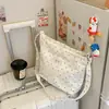 Bolsa de ombro casual transfronteiriça nova 2026, estilo coreano da moda, simples e jovial, versátil para o uso diário