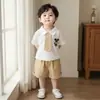 2026 Nuevo Conjunto de Dos Piezas de Verano para Bebé Estilo Academia con Corbata de Manga Corta Ropa para Hermanos Ropa Infantil Venta al por Mayor