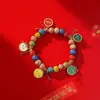 Accesorios Pequeños Más Vendidos para Puestos de Año Nuevo, Pulseras de Cerámica con Hilo Rojo, Cuerdas para la Mano, Joyería, Cuerdas para la Mano del Festival de Primavera, Venta al Por Mayor Directamente del Fabricante