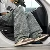 Jeans retro de estilo americano con estampado completo de jacquard de letras para hombre, populares pantalones largos de moda para jóvenes de primavera y otoño para hombre